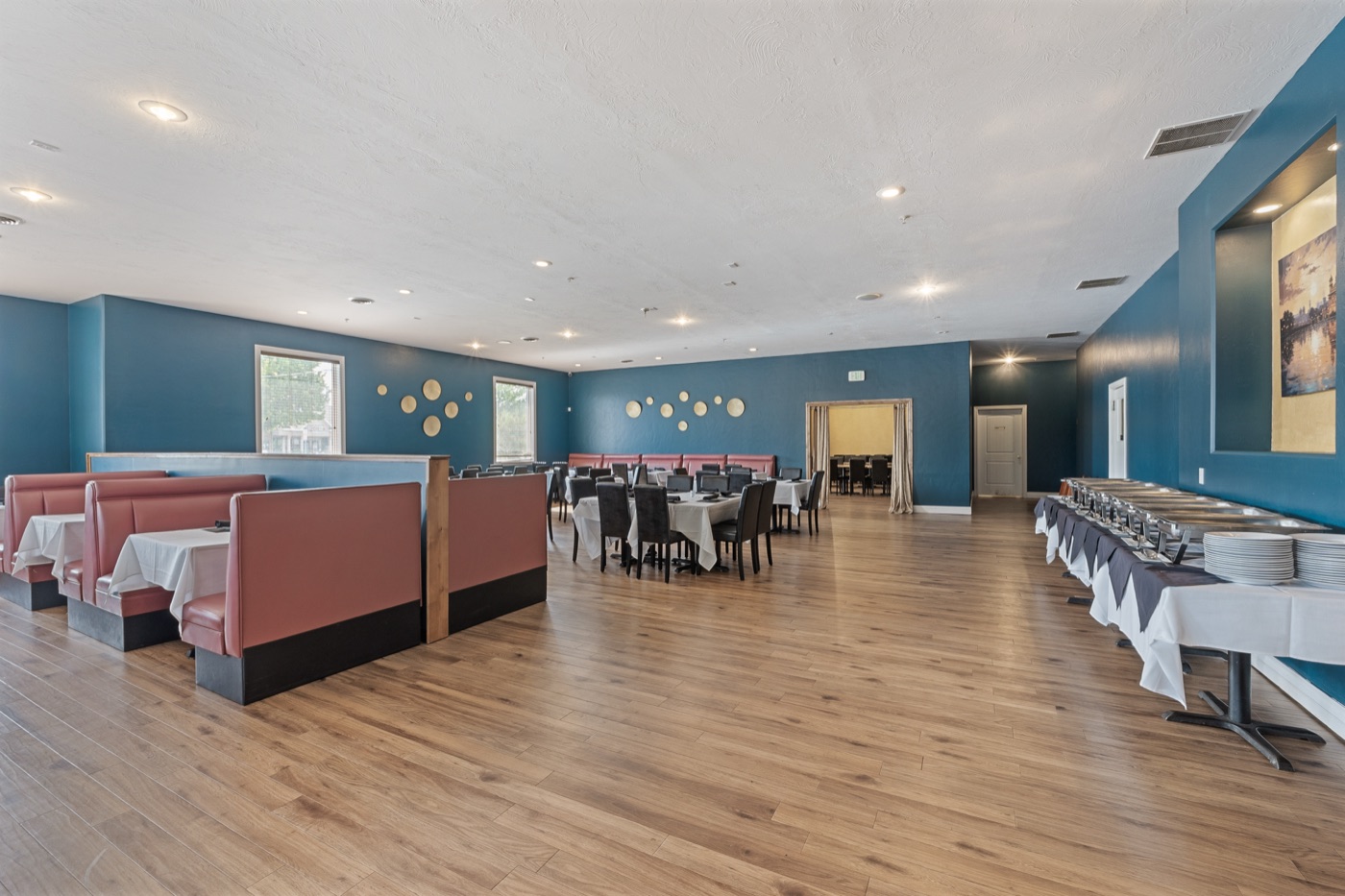 Main dining hall with booth and table seating