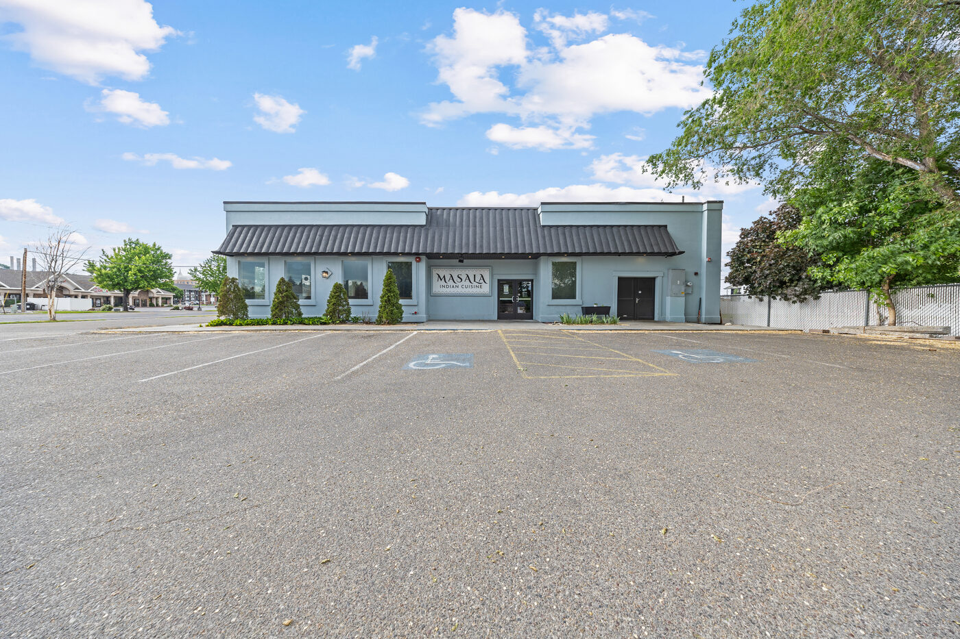 Front exterior with parking lot